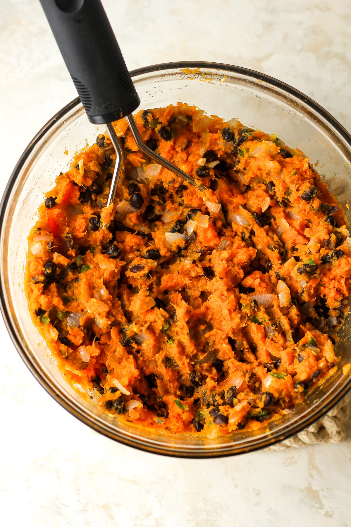 A bowl of the sweet potato and veggie mixture.