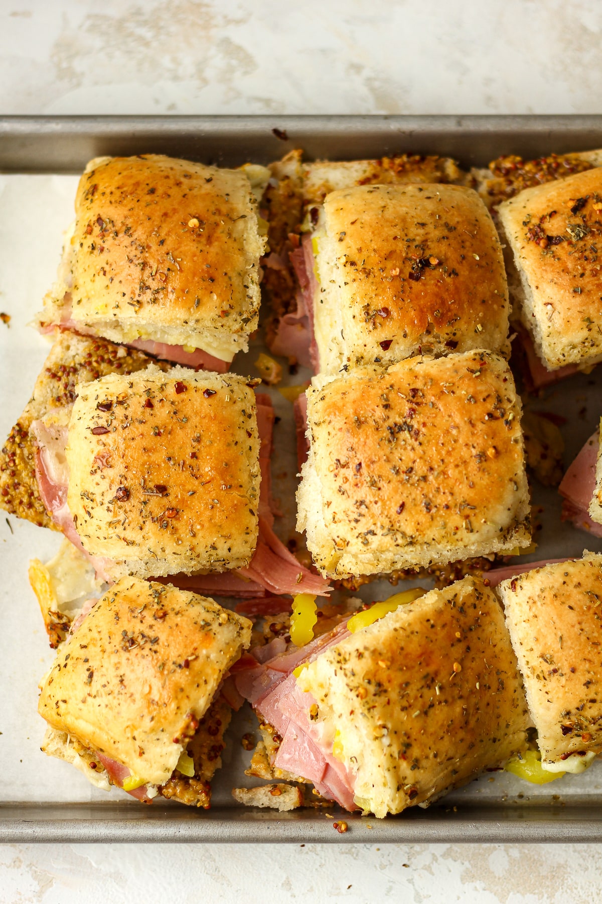 Overhead view of some cut slider sandwiches.