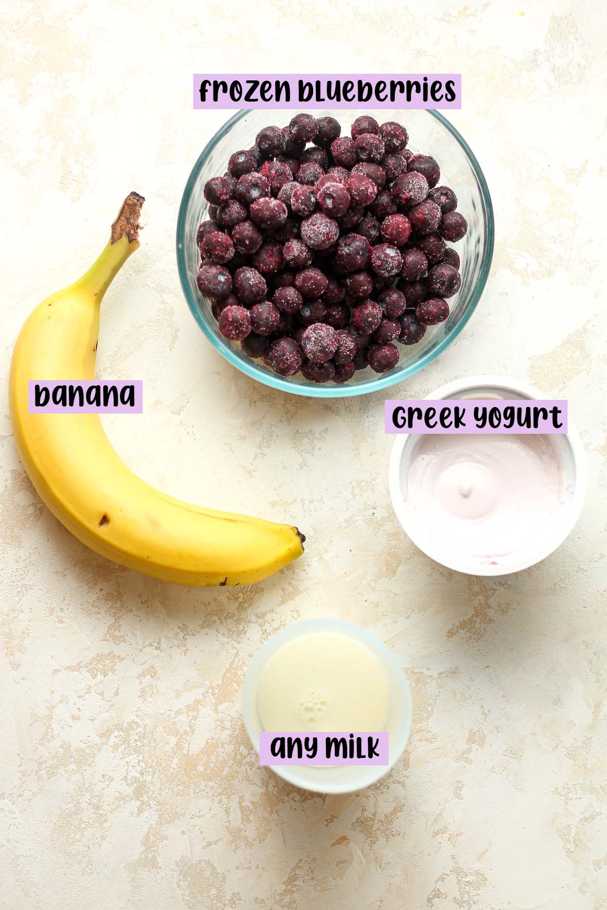 The ingredients for blueberry smoothie bowls.