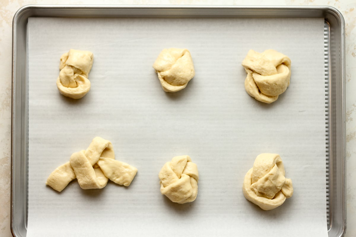 A pan of the knots dough before baking.