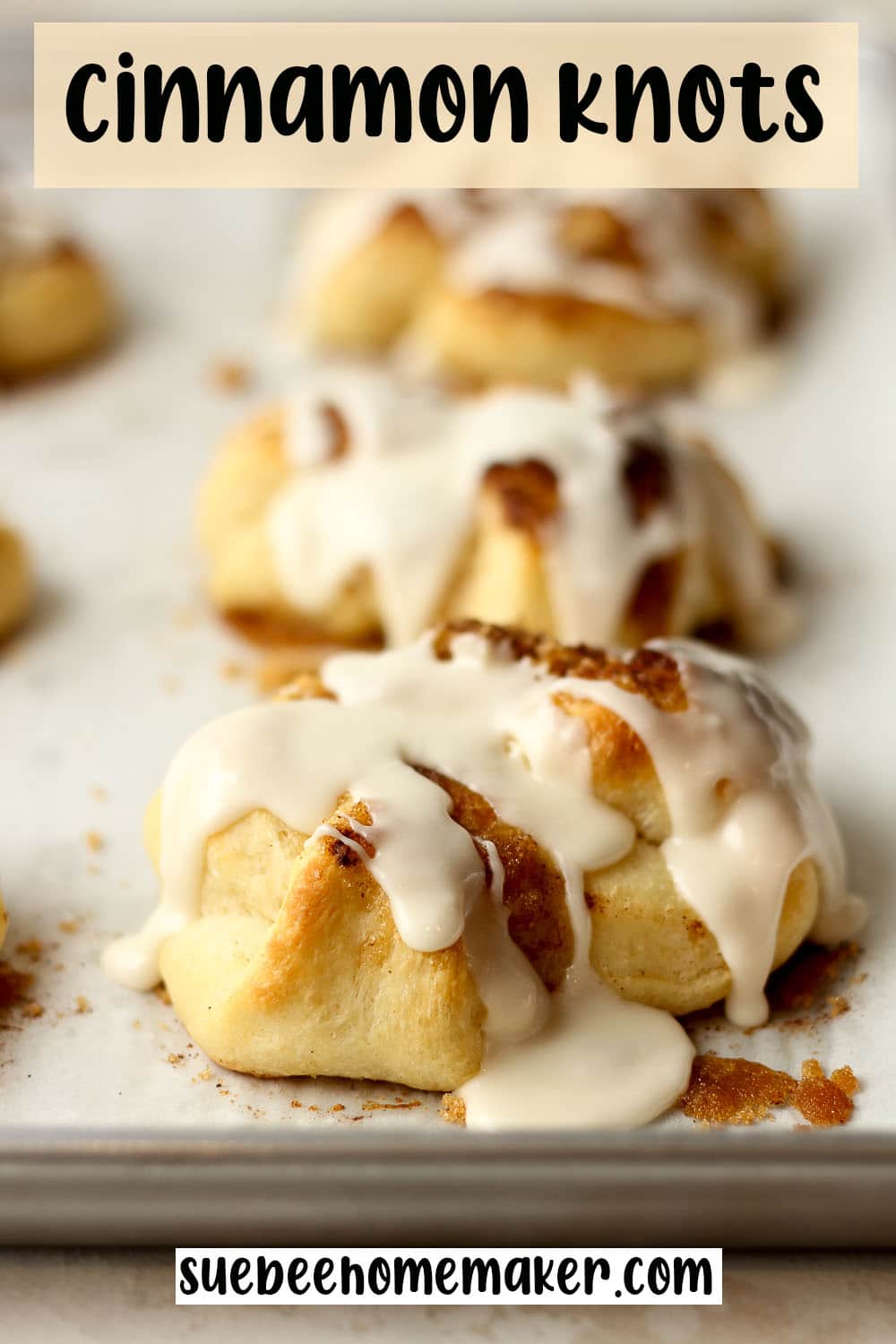 Side view of a pan of cinnamon knots.