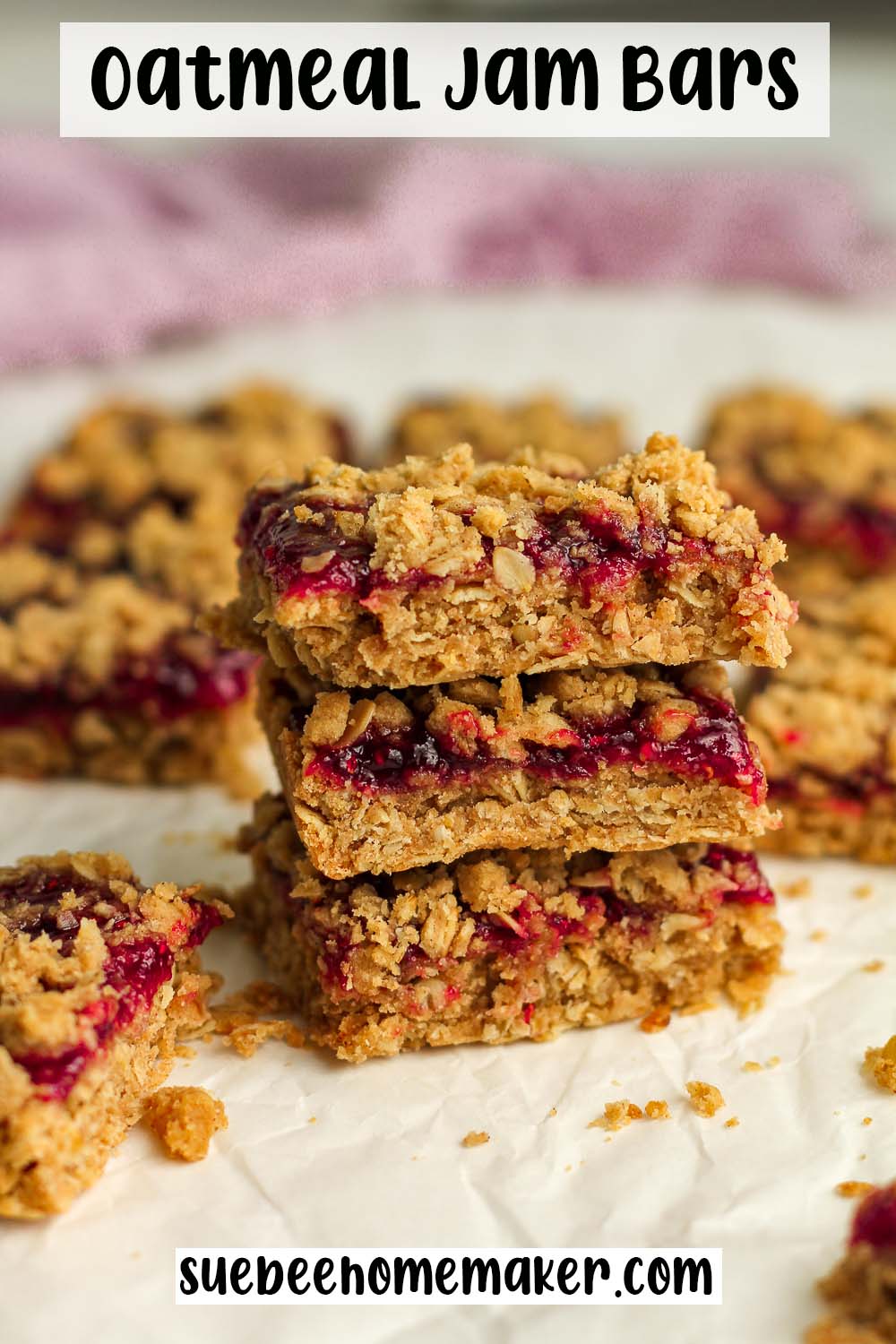 A stack of three oatmeal jam bars.