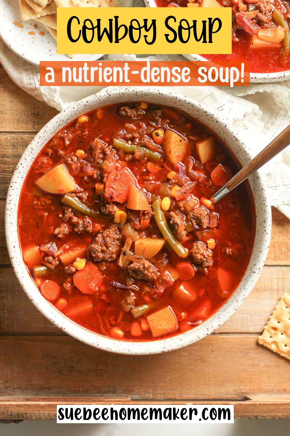 A bowl of Cowboy soup with a spoon.