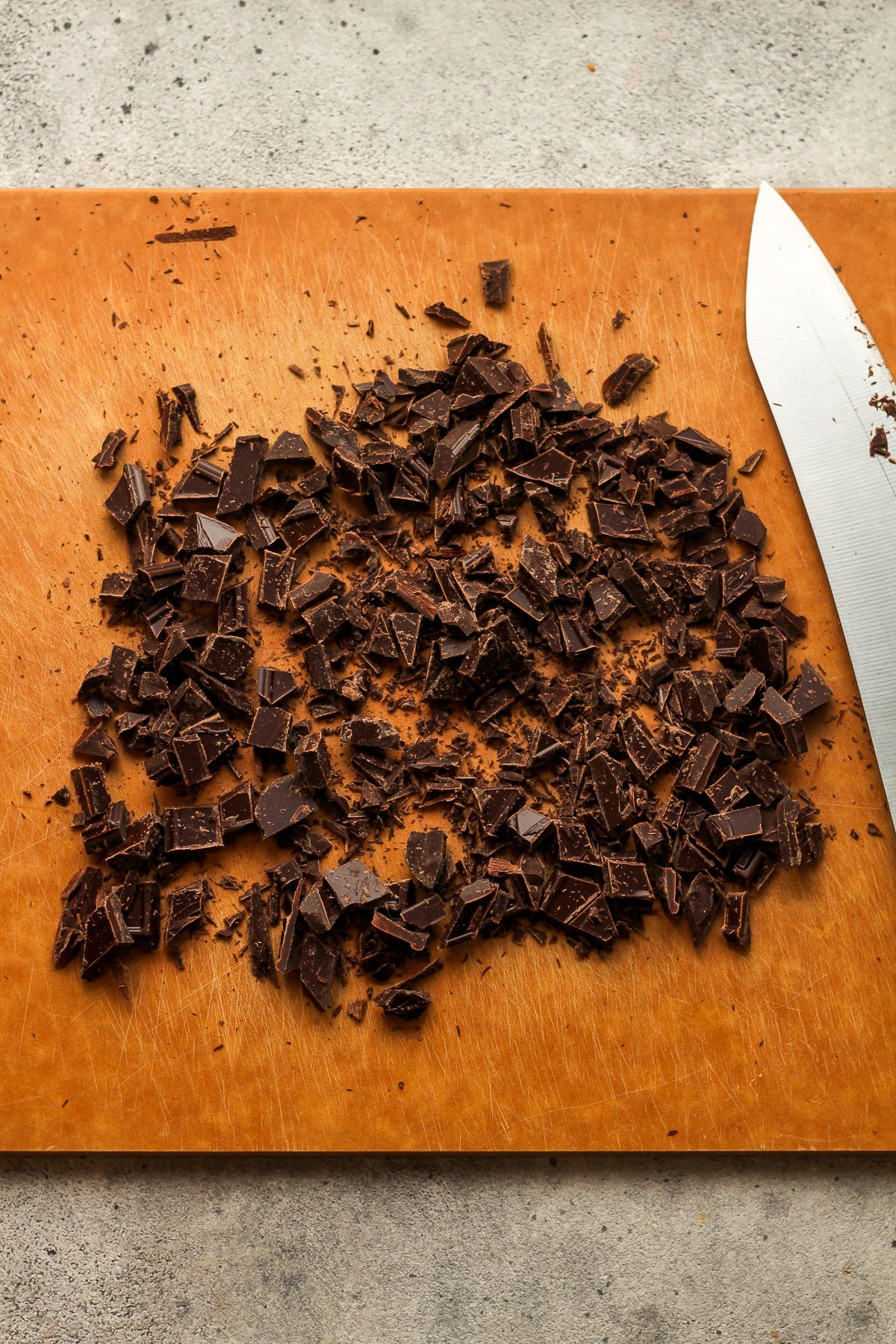 A board of the chopped dark chocolate.