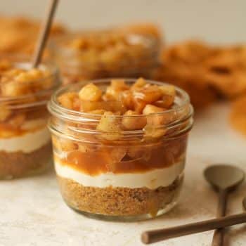 Closeup on a mason jar of mini apple pie.