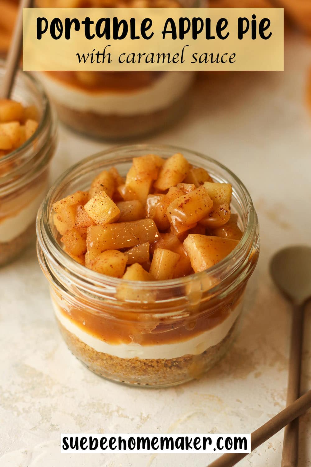 Overhead view of a small mason jar filled with apple pie and caramel sauce.