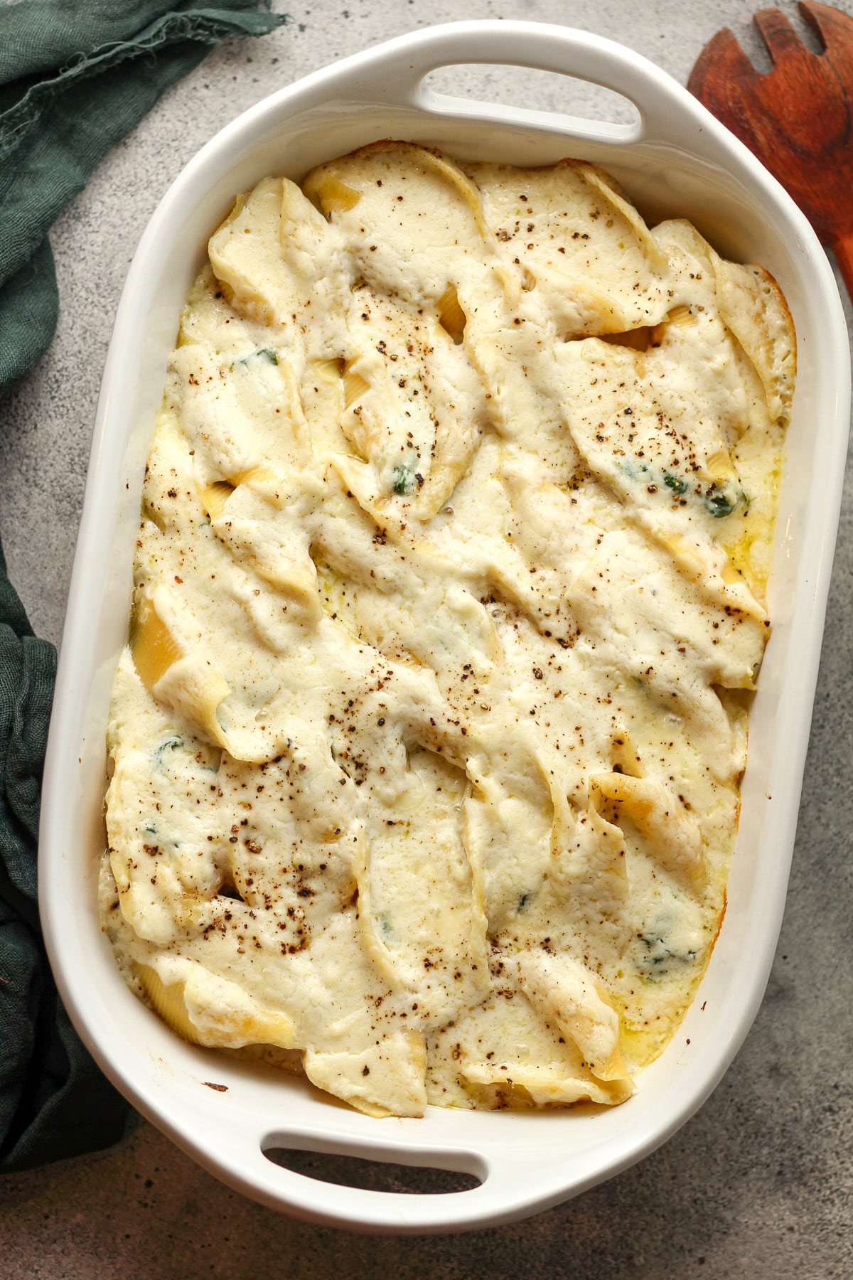 A casserole dish of the Alfredo stuffed shells.