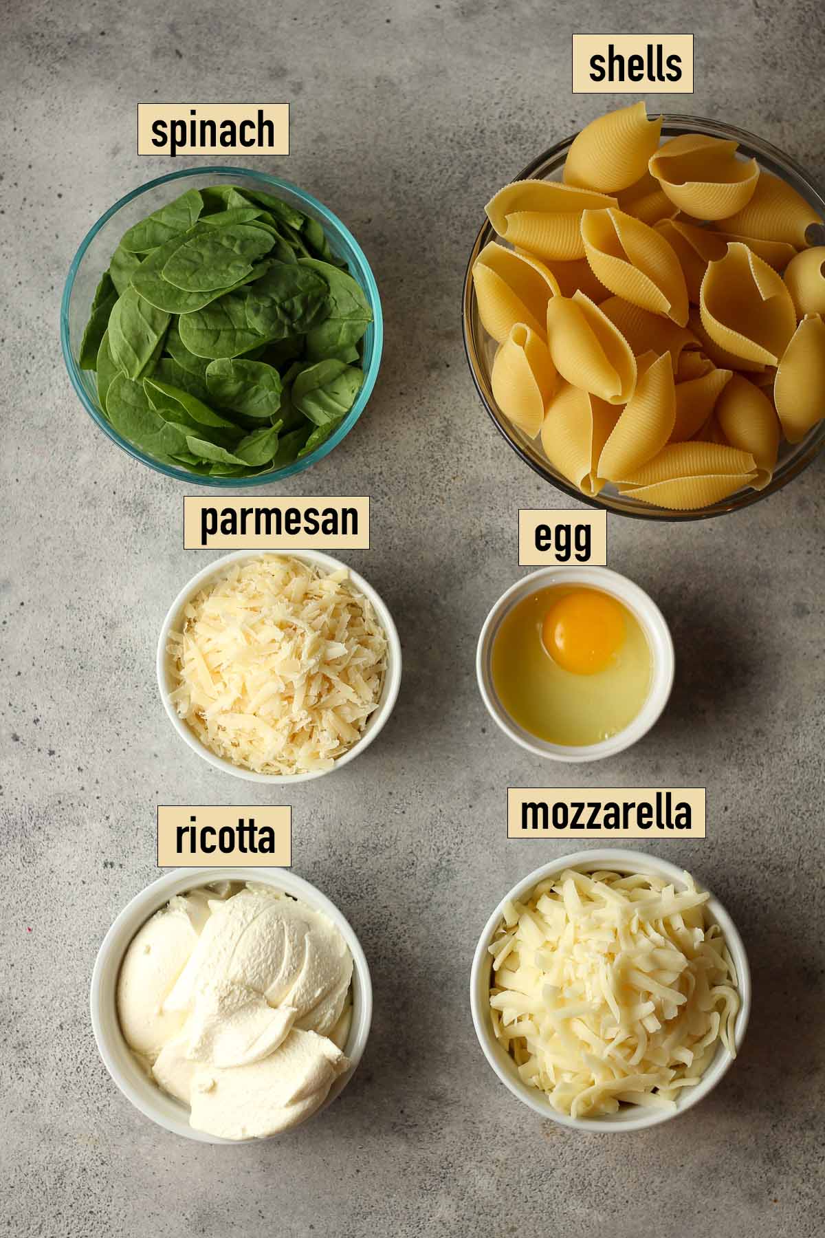 Labeled ingredients for the stuffed shells.