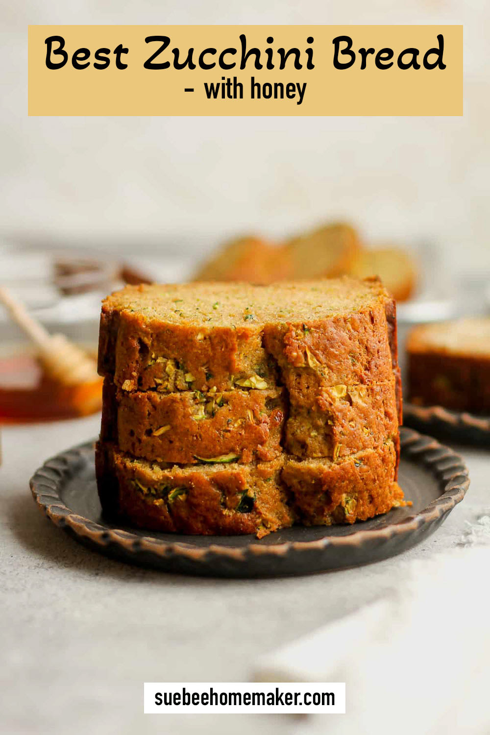 Three stacked slices of the best zucchini bread with honey.
