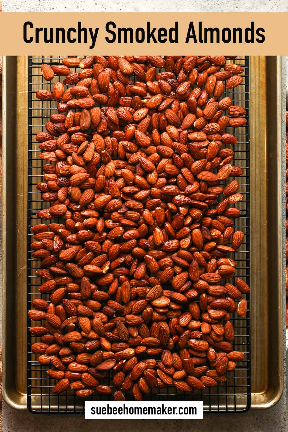 A large sheet pan of crunchy smoked almonds.