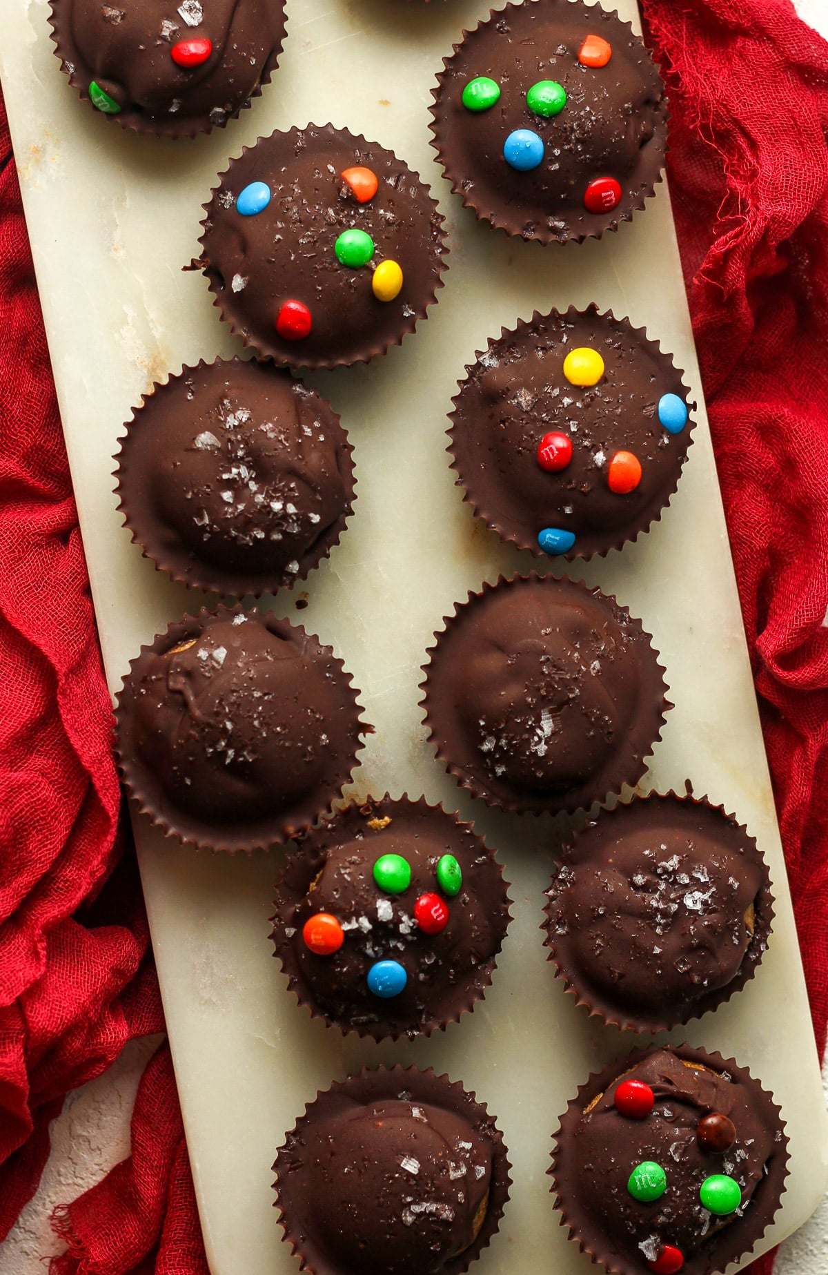 A white tray of the finished healthy peanut butter cups.