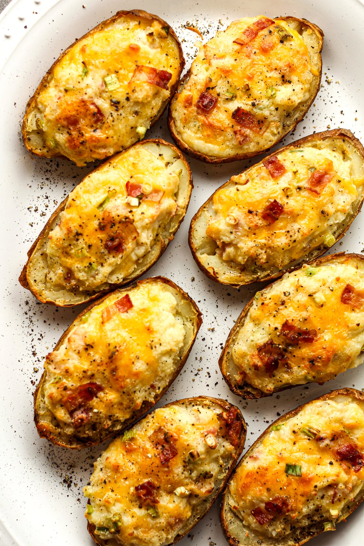 A platter of 8 twice baked potatoes.