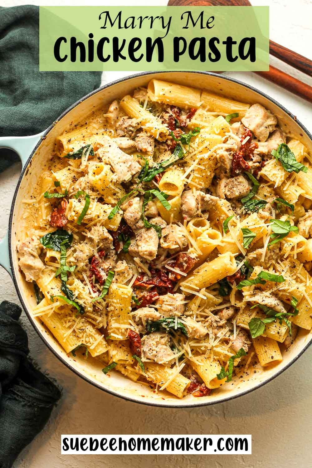 A large pot of Marry Me Chicken Pasta with fresh basil.