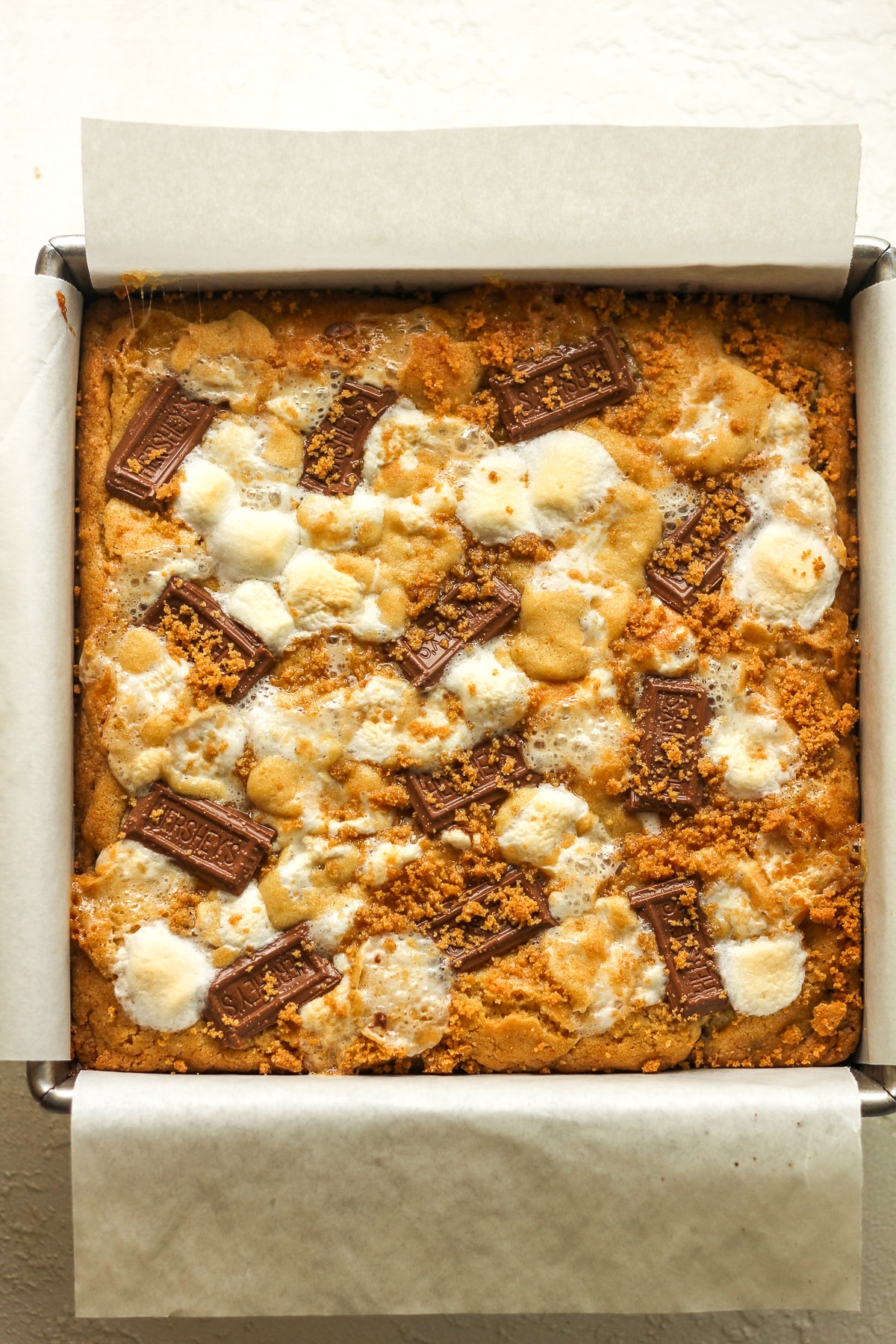 A square pan of s'mores cookie bars.