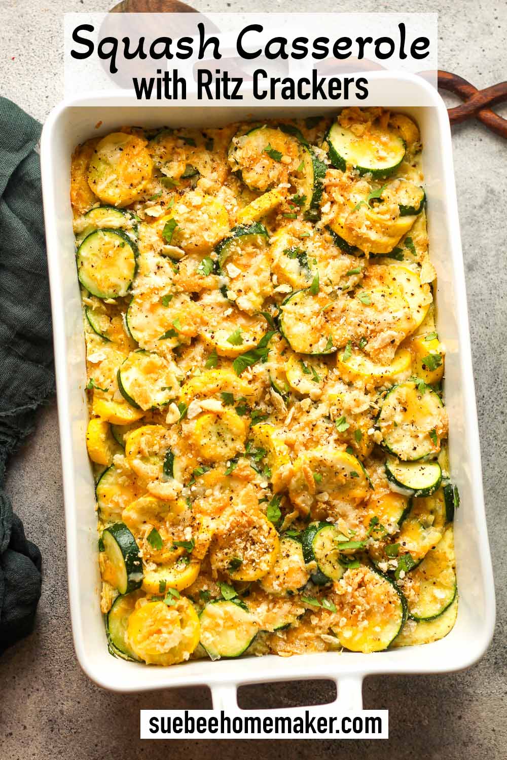 A large squash casserole with ritz crackers.