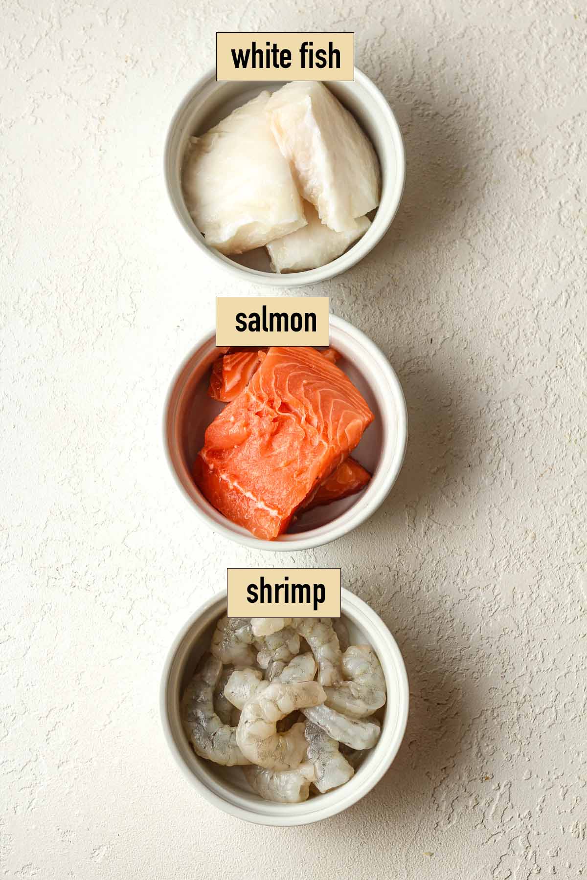 Three bowls of the different types of fish.