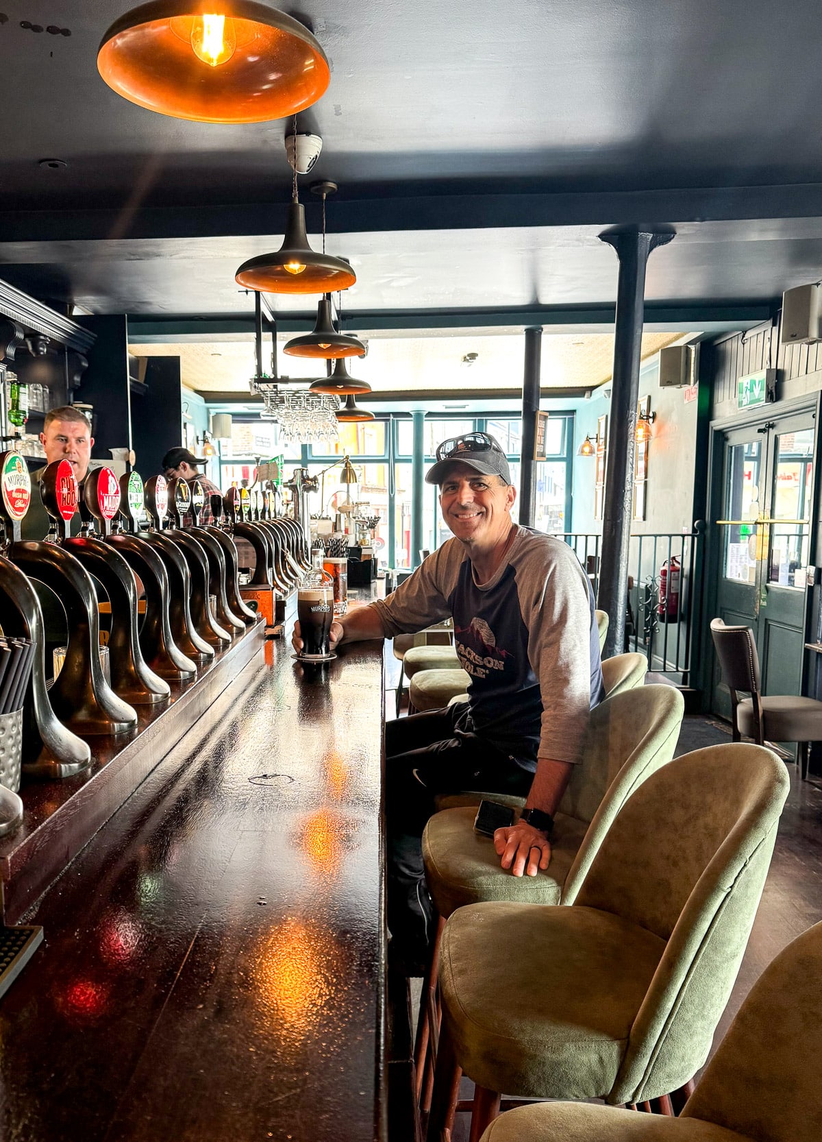 Mike having a Guiness at a pub.