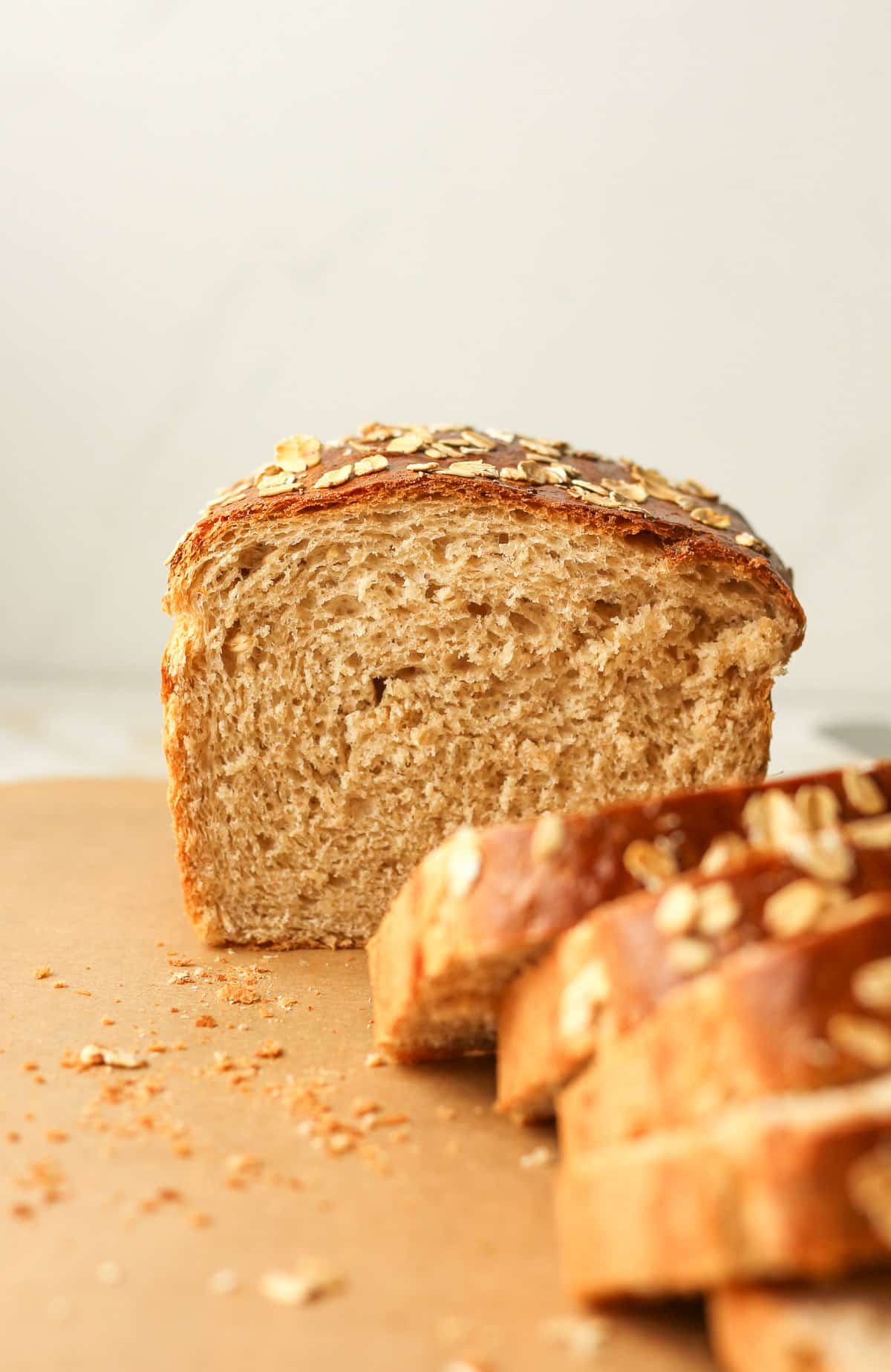 Side view of the inside of a loaf of oatmeal bread.