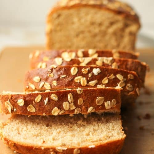 Side view of some sliced oatmeal bread.