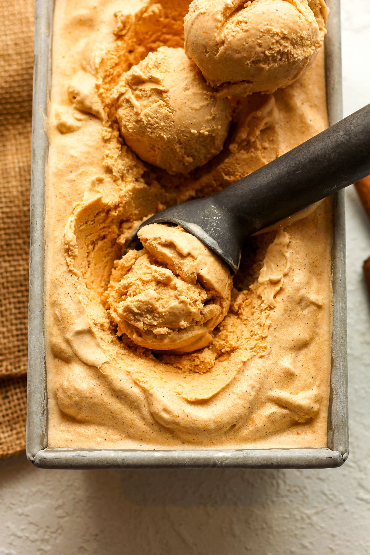 Closeup on some scoops of ice cream.