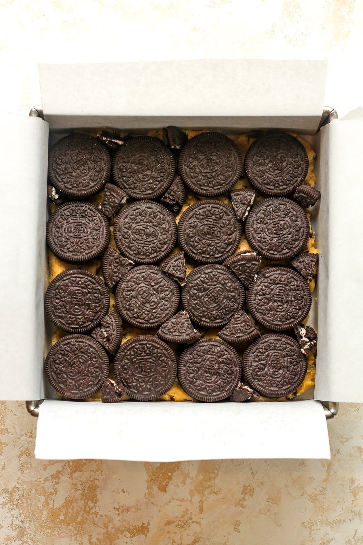 The Oreo cookie layer on top of the cookie dough.