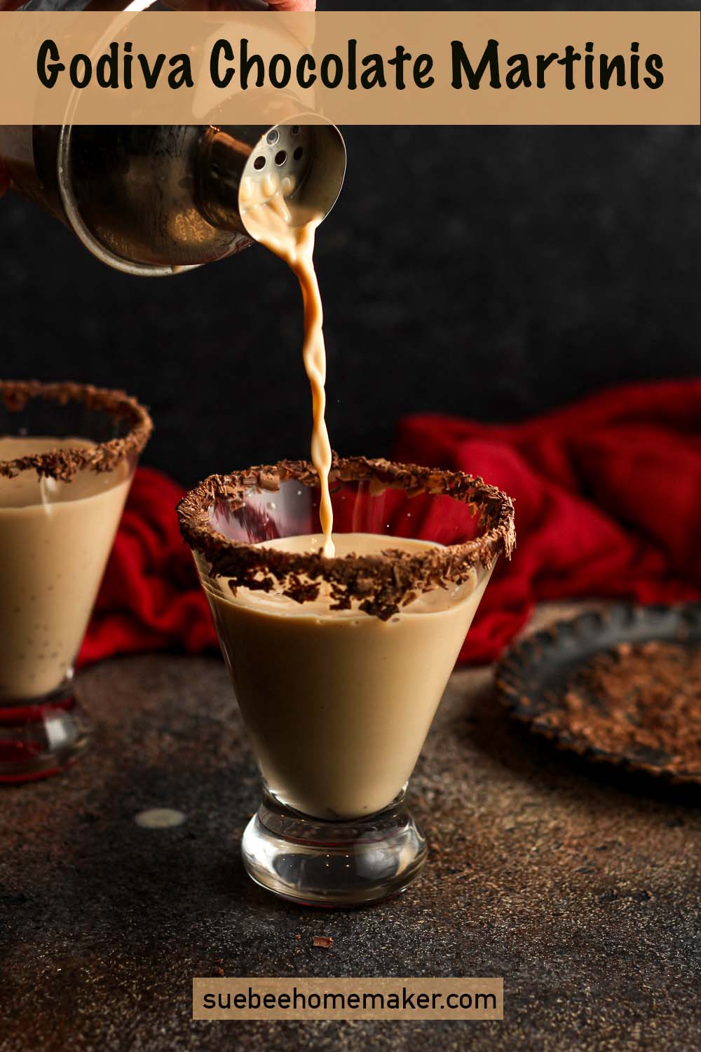 Side view of two Godiva chocolate martinis on a dark surface.