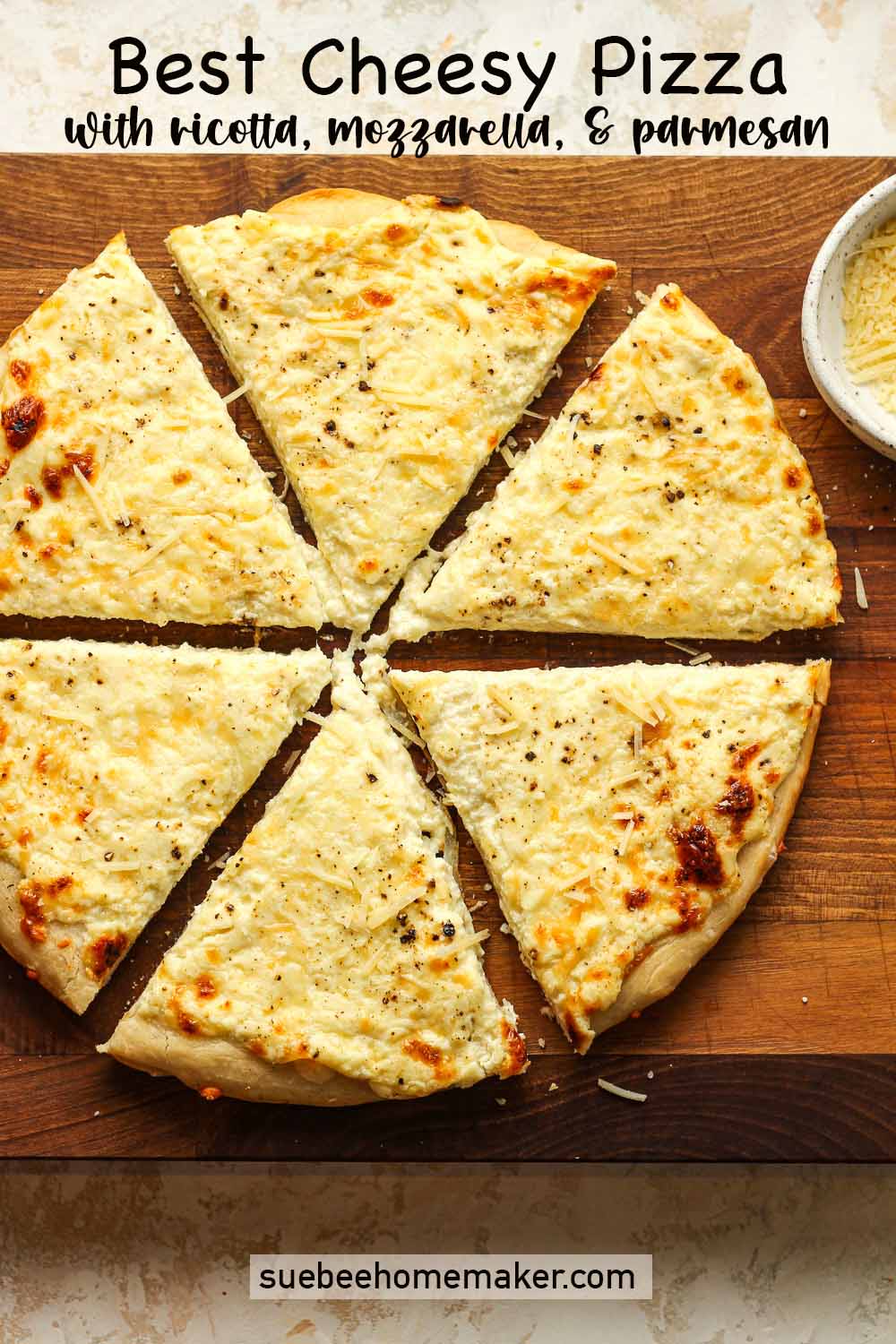 Overhead view of six triangular slices of the Best Cheesy Pizza.