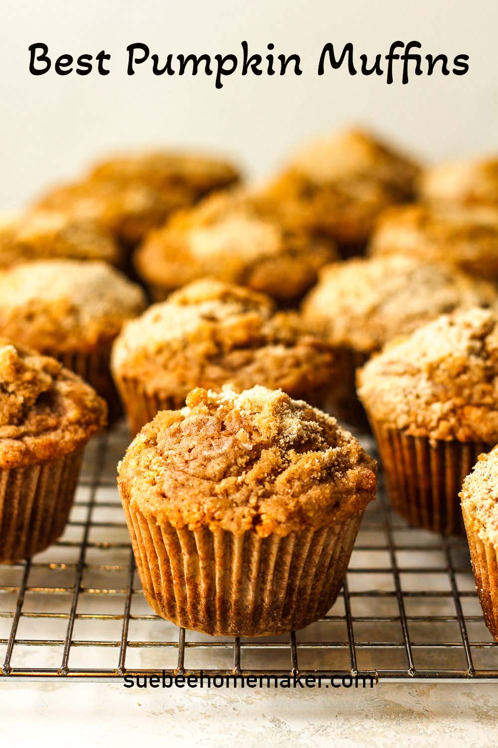 Side view of a wire rack of the Best Pumpkin Muffins.