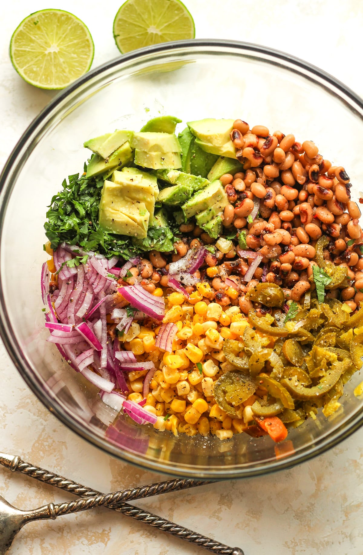 A bowl of the dip separated by ingredient.