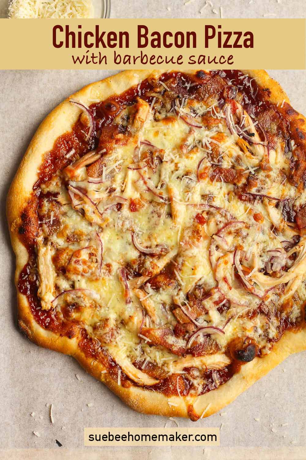 A just baked chicken bacon pizza with barbecue sauce.