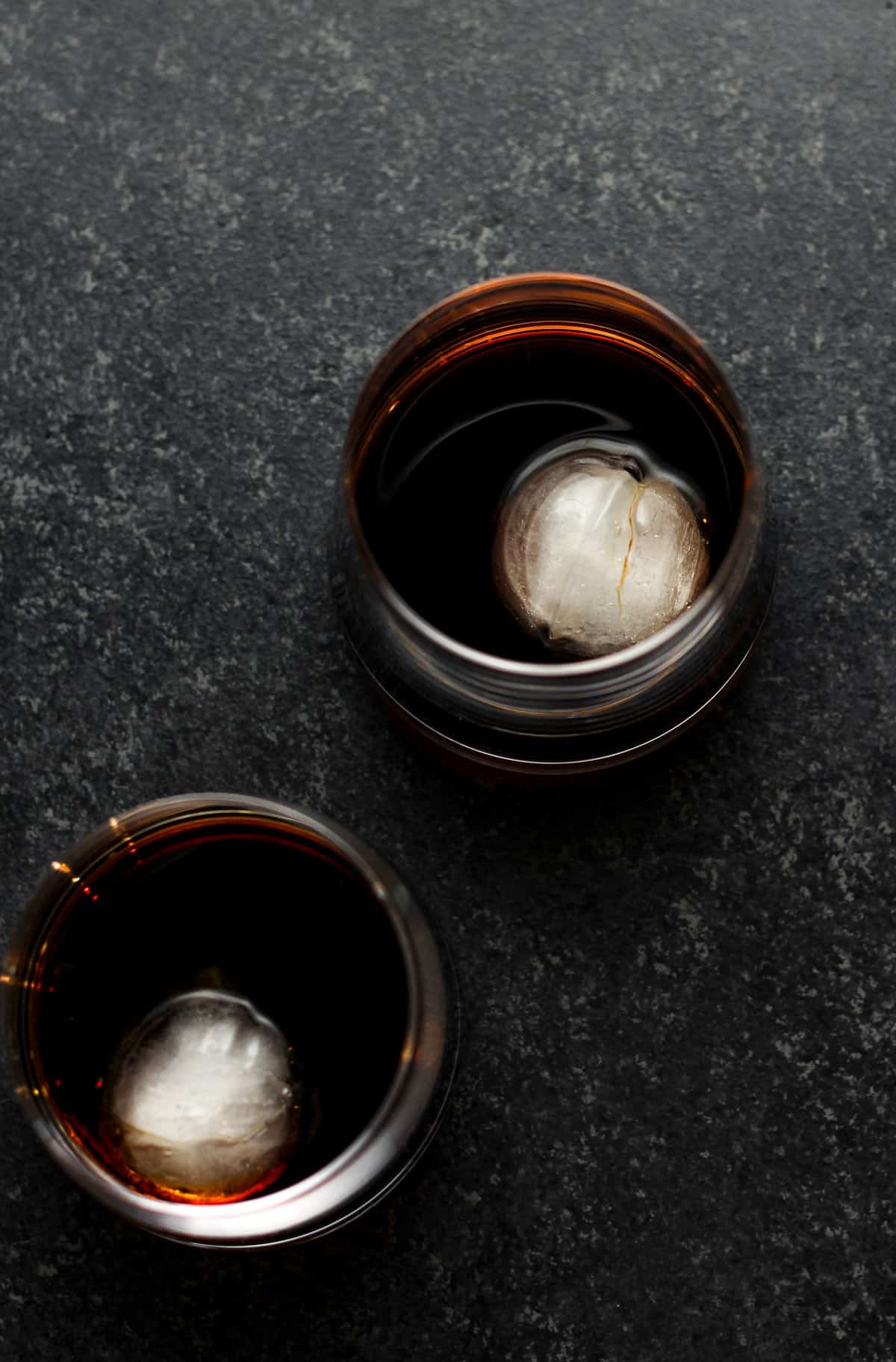 Two glasses of the vodka and Kahlua plus round ice cubes.