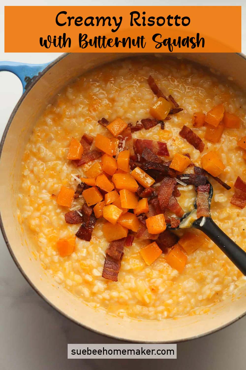 A large pot of creamy risotto with butternut squash and bacon.