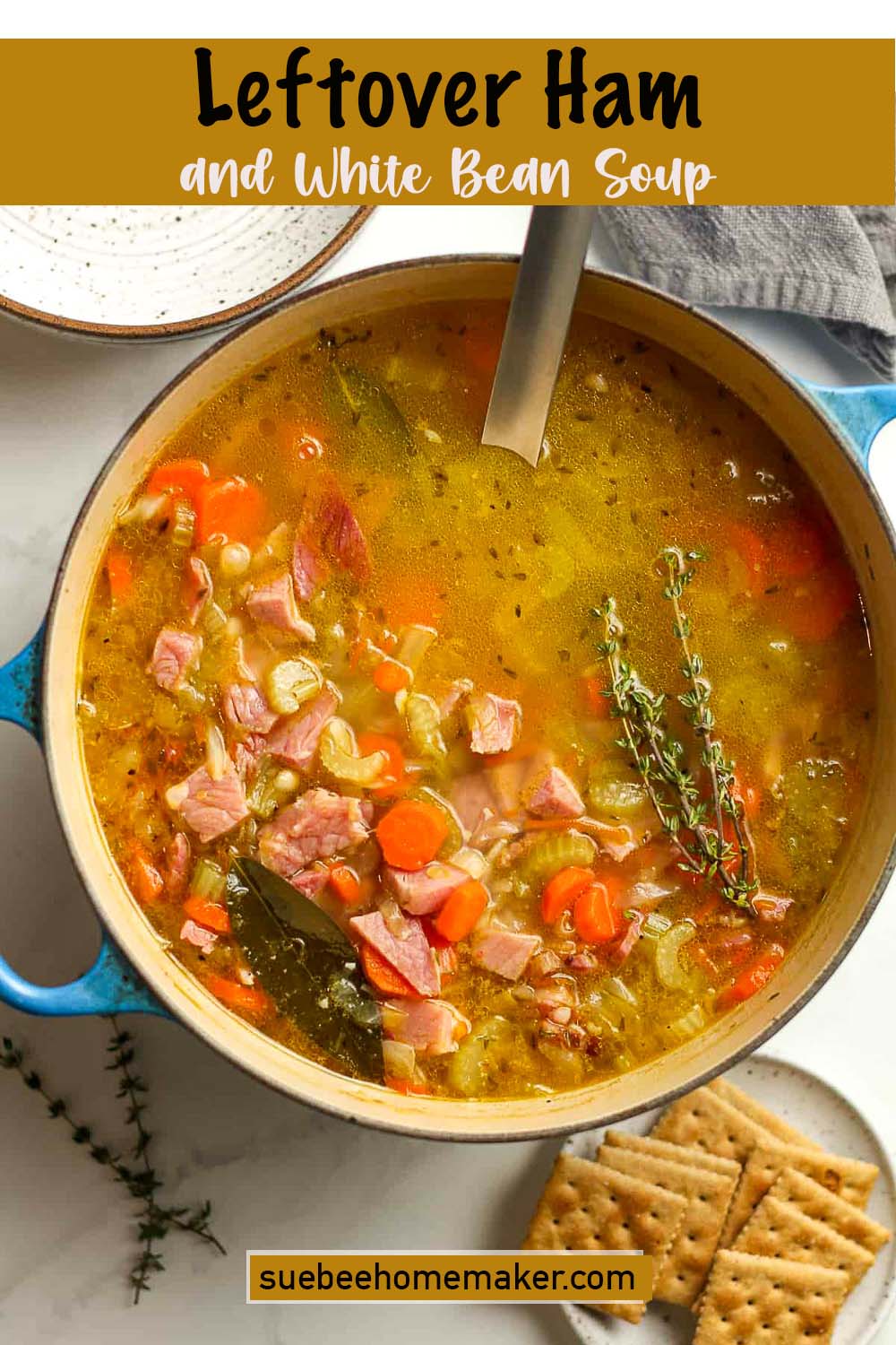 A large pot of leftover ham and white bean soup with dried thyme.