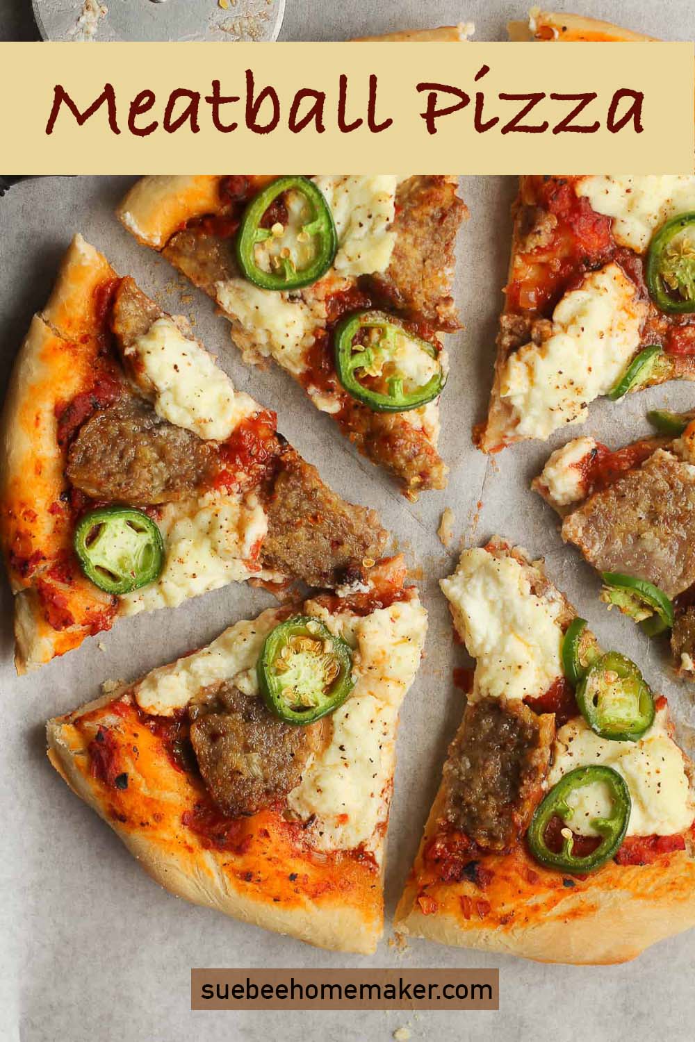 A sliced meatball pizza with ricotta and jalapeños.