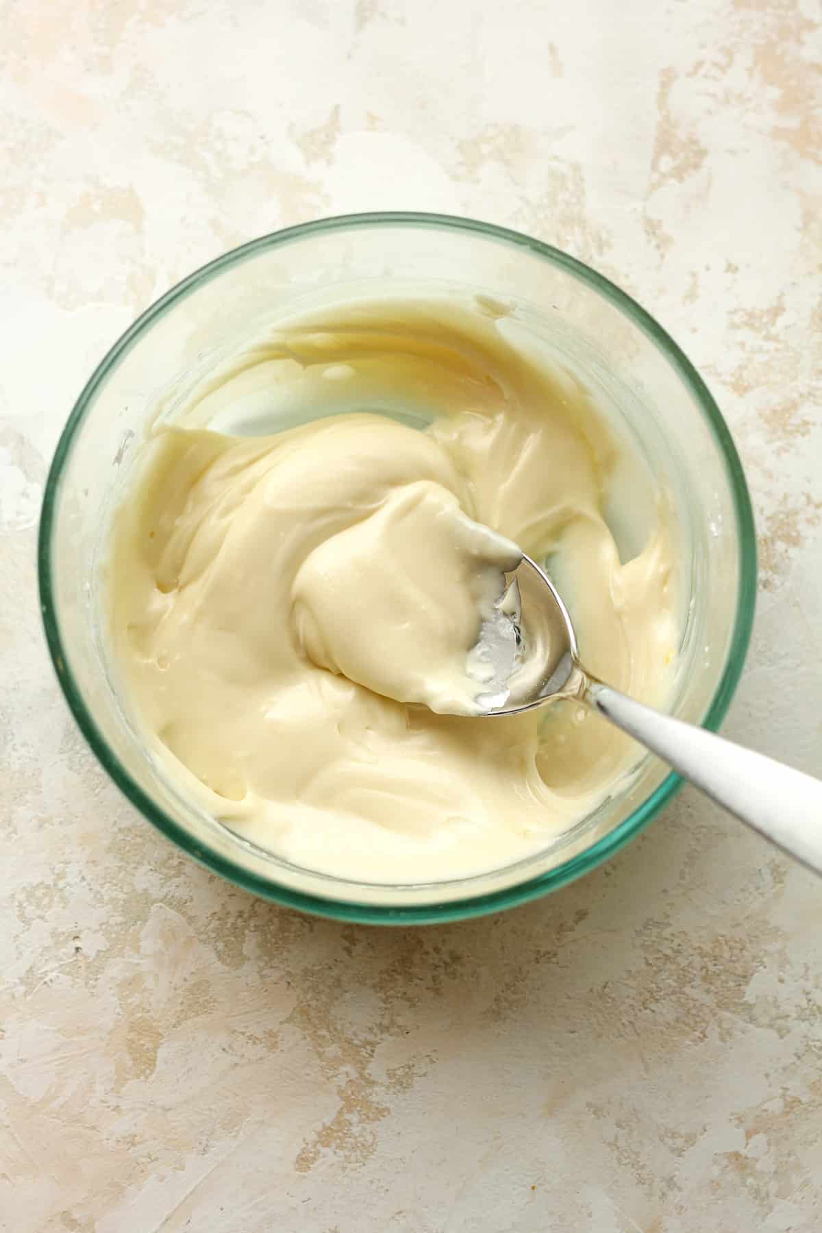 A bowl of the orange glaze.