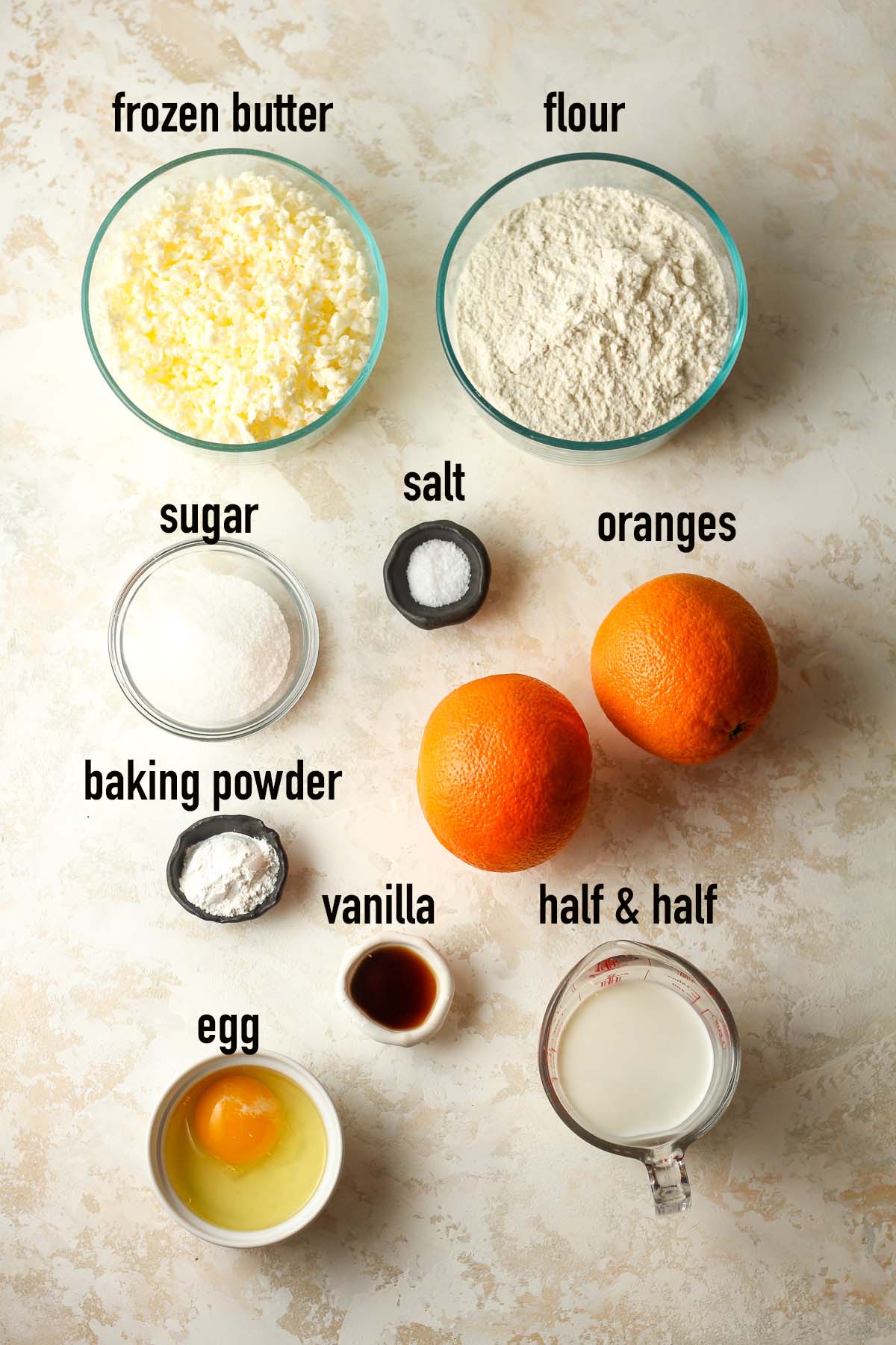 The labeled ingredients for orange scones.