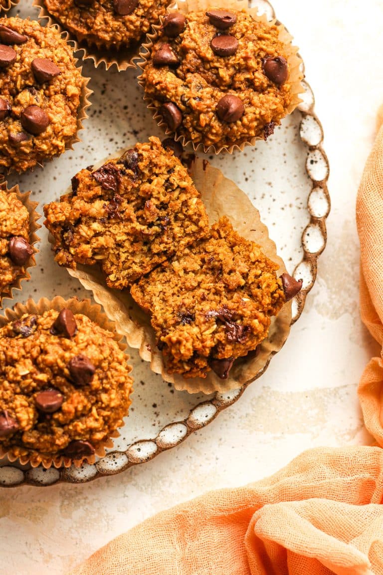 A plate of the muffins with one split in half.