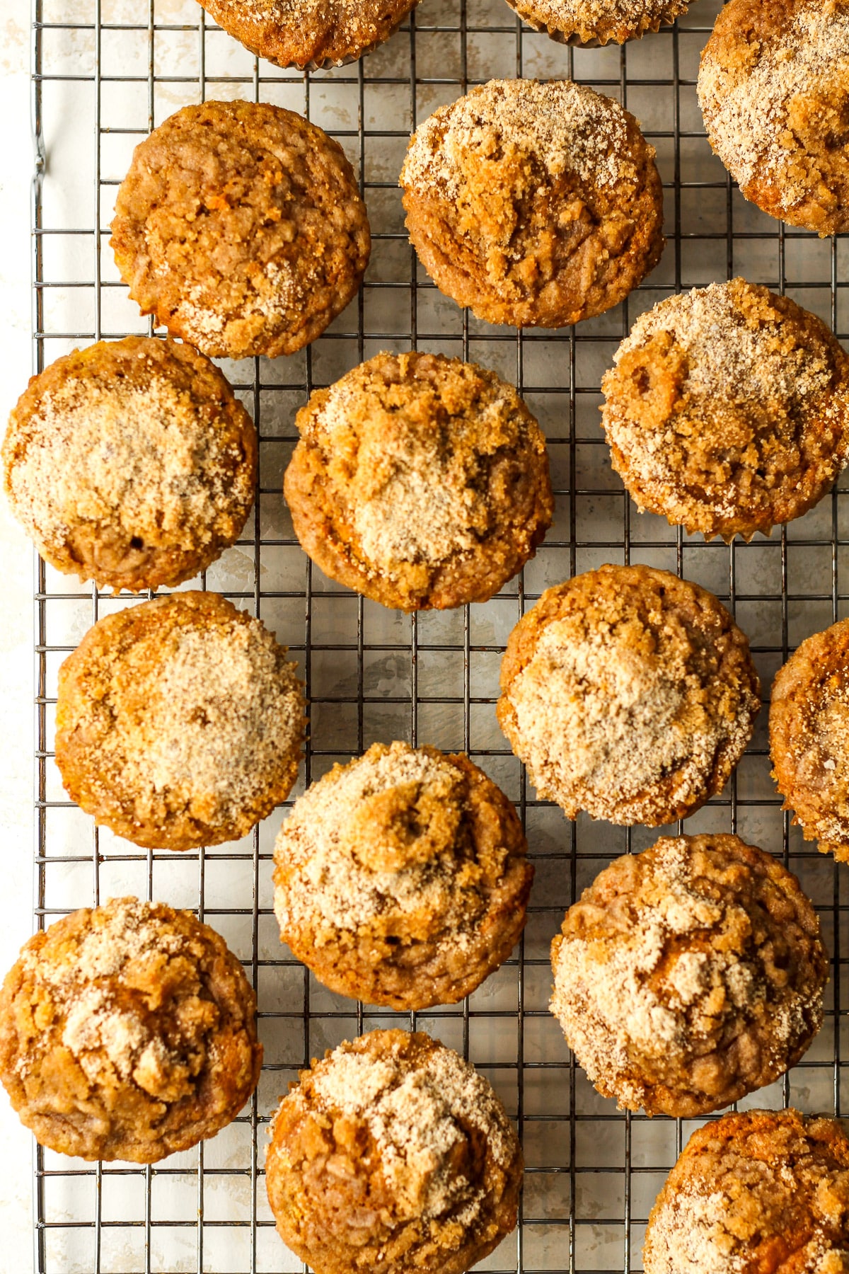 Overhead view of a rack of pumpkin muffins.