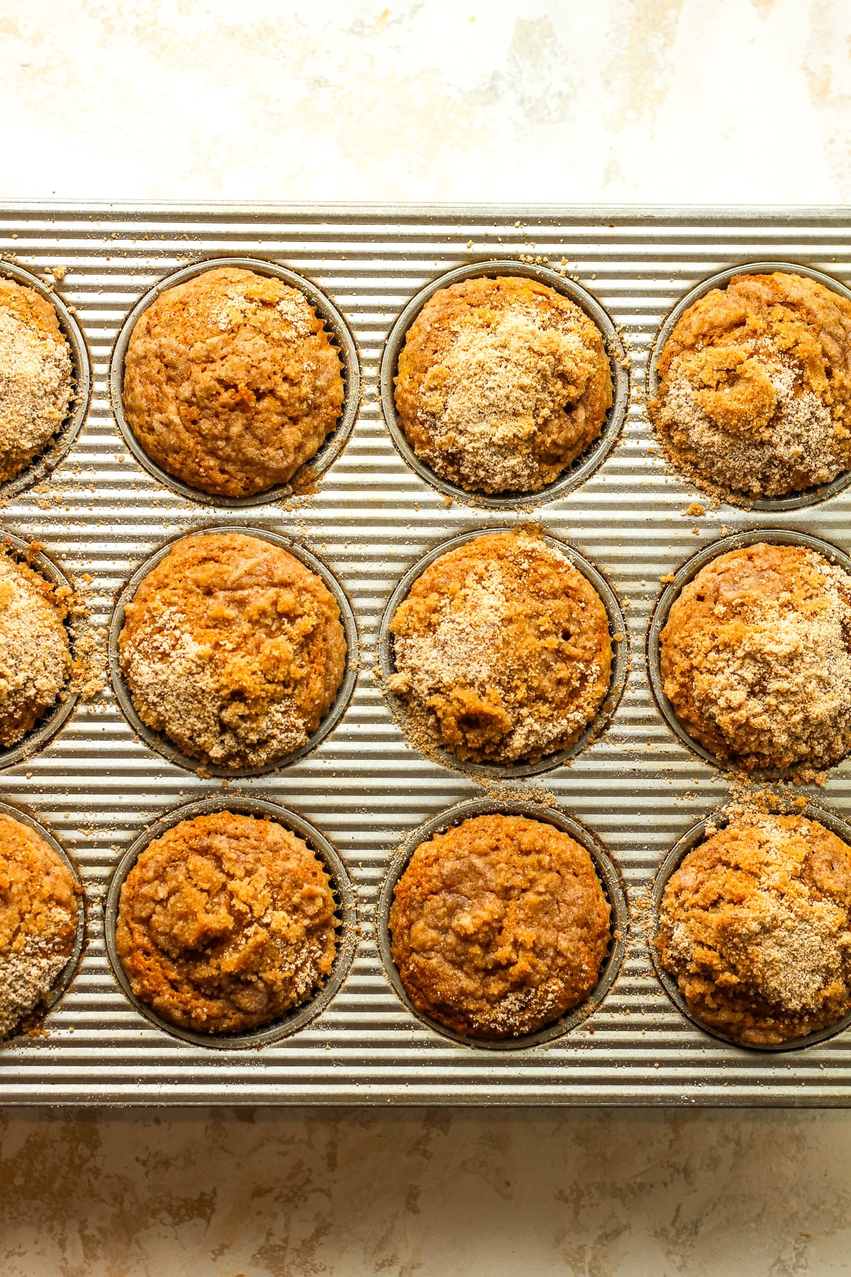 The muffin tin of baked muffins.