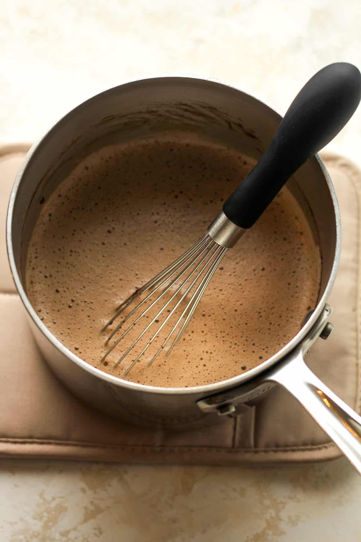 A pot of the tempered egg mixture.