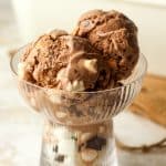 Closeup on a dish of rocky road ice cream.