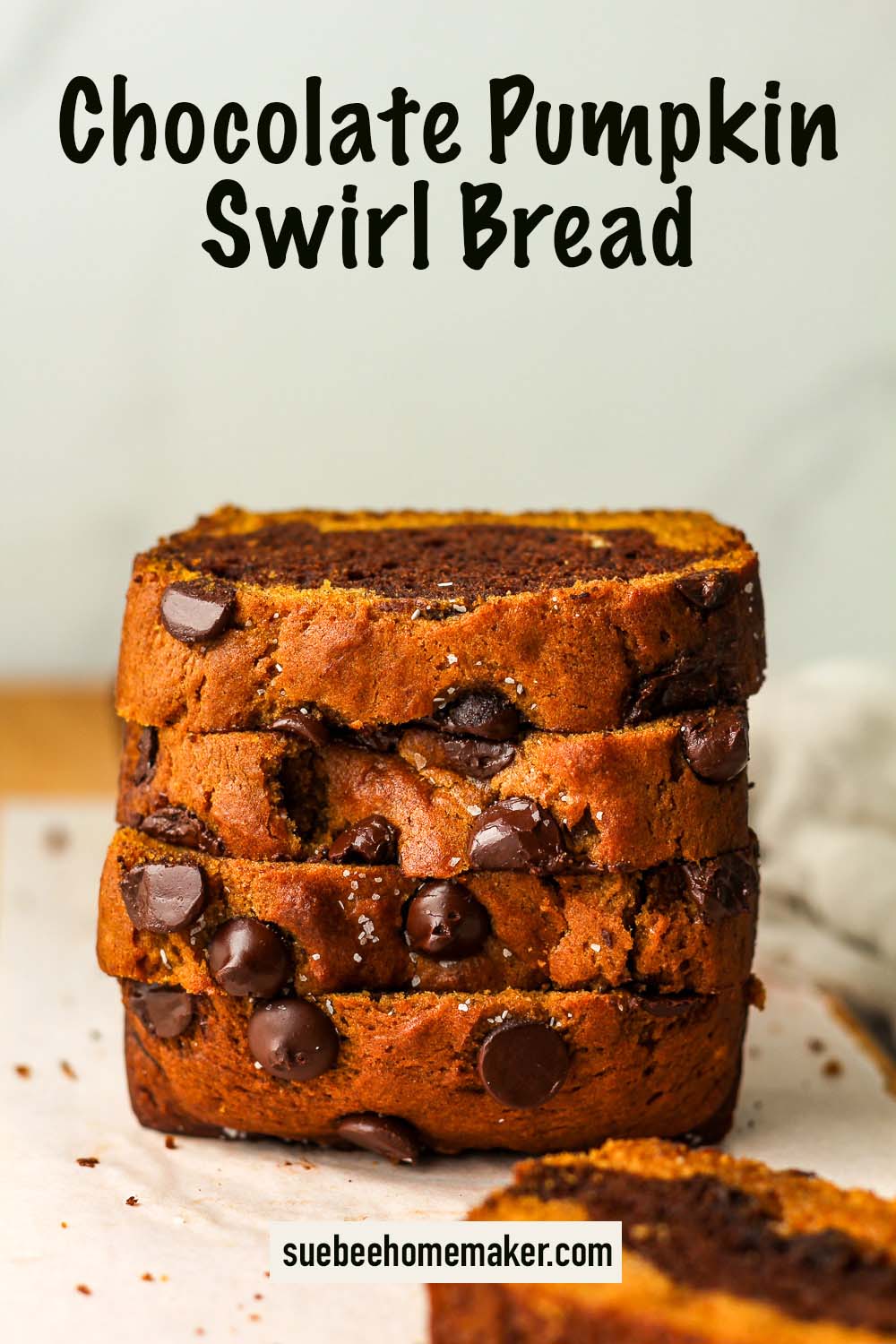 Side view of four slices of chocolate pumpkin swirl bread.