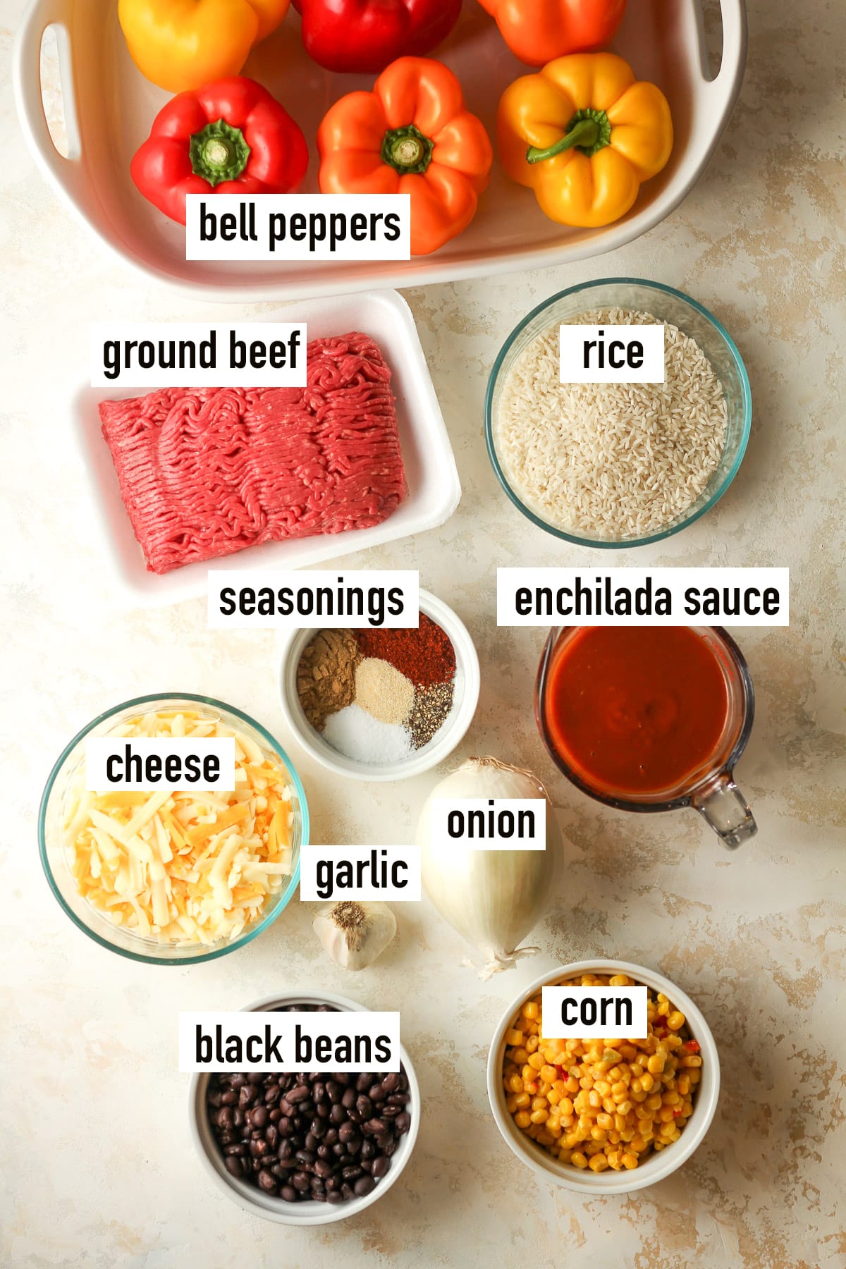 Labeled ingredients for enchilada stuffed peppers.