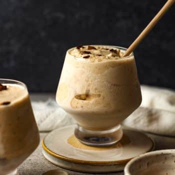 Side view of a full glass of frozen kahlua cocktail.