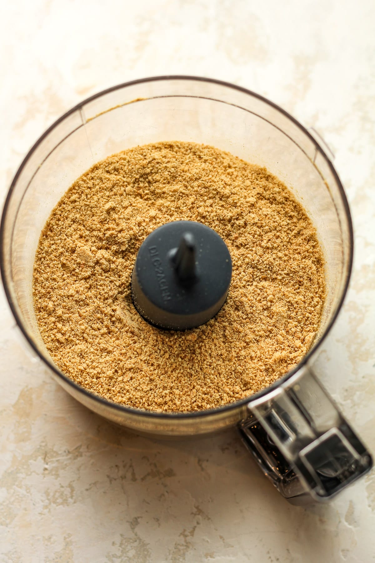 A food processor of the graham crumbs.