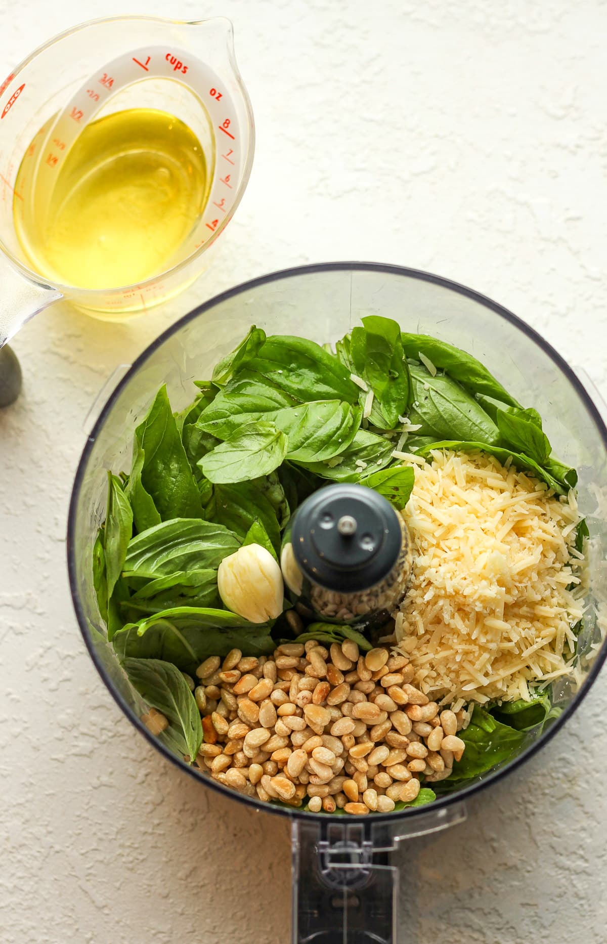 The ingredients for the pesto sauce for shrimp pasta.