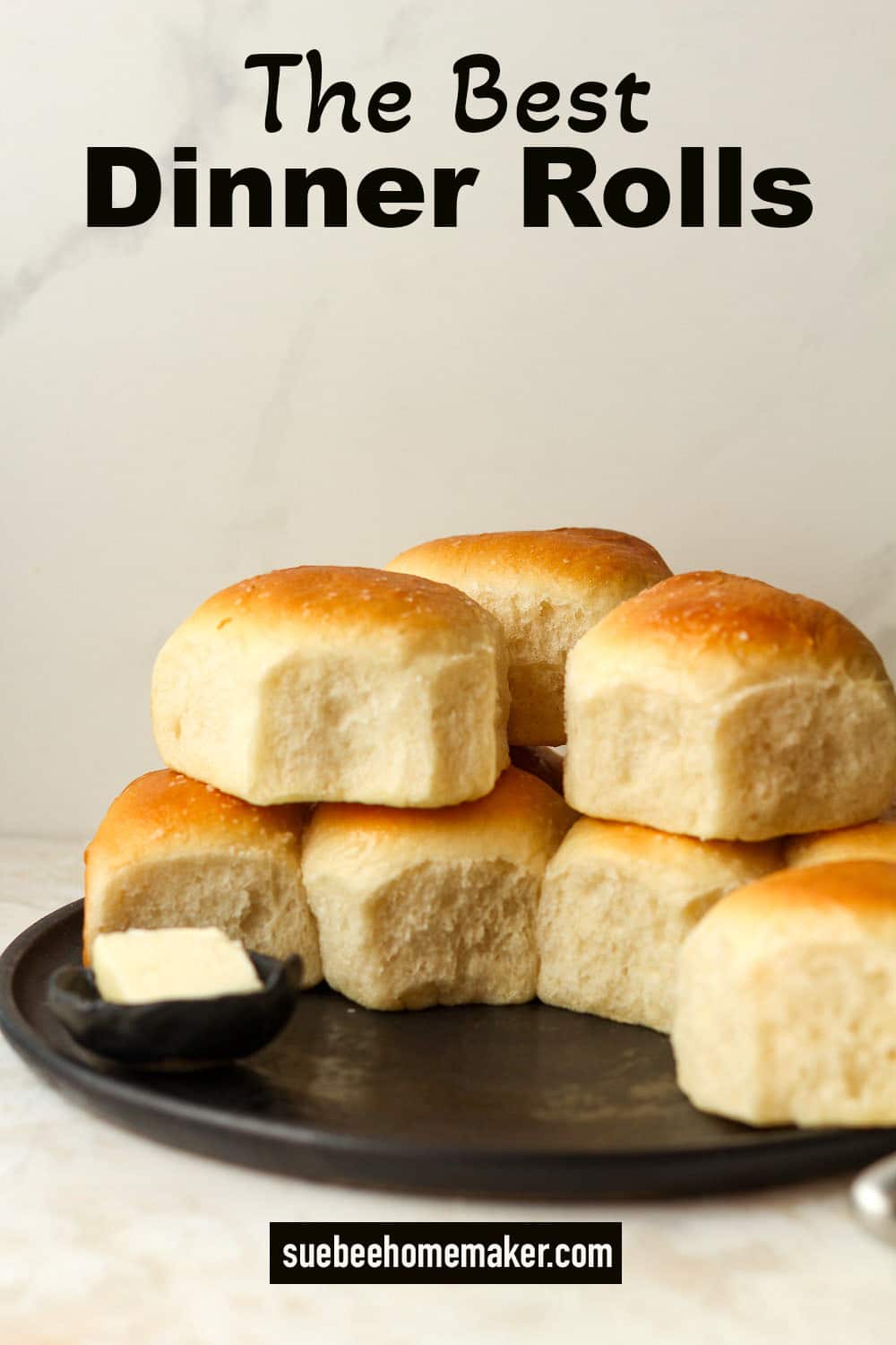 Side view of a plate of the the best dinner rolls.