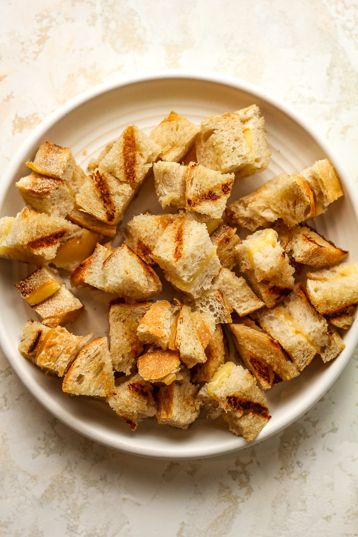 A plate of grilled cheese croutons.