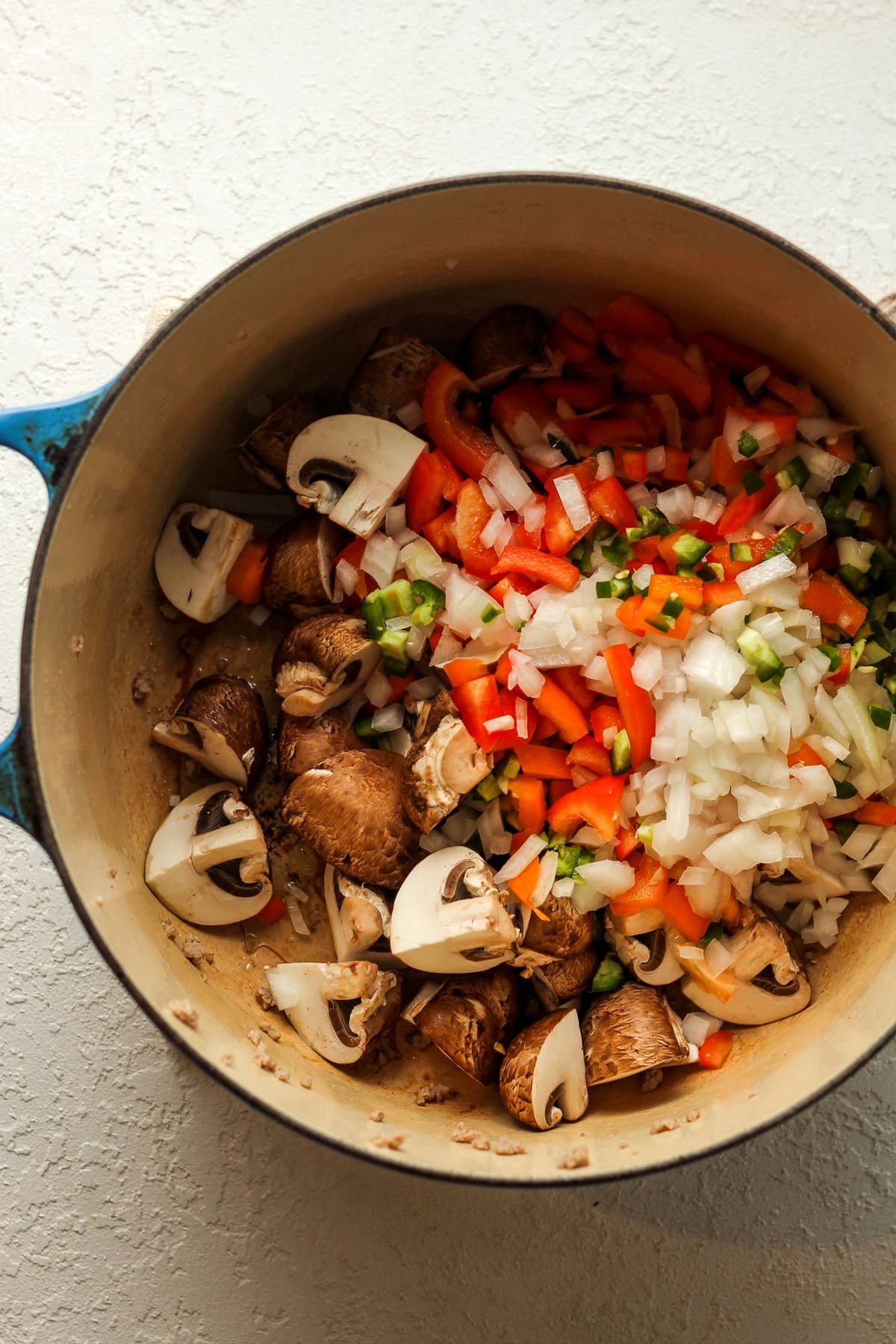 A pot of the prep veggies - peppers, onions, mushrooms.