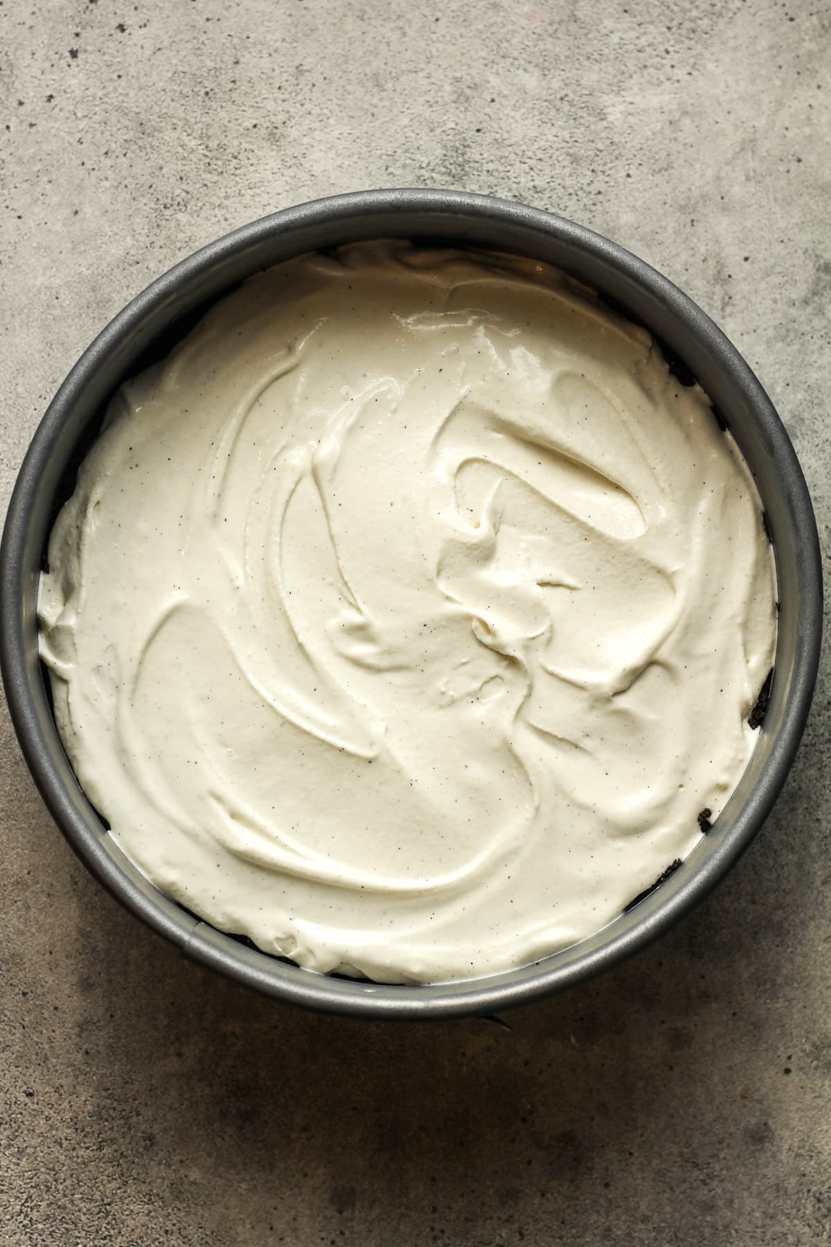 The vanilla ice cream layer on top of the Oreo crust.